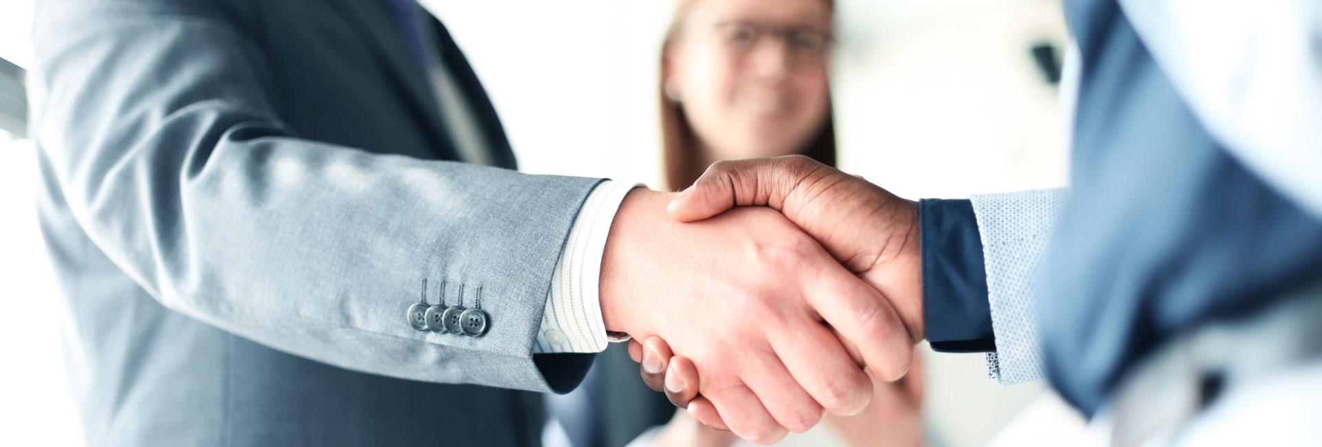 District F Access to Justice image of attorney and client shaking hands